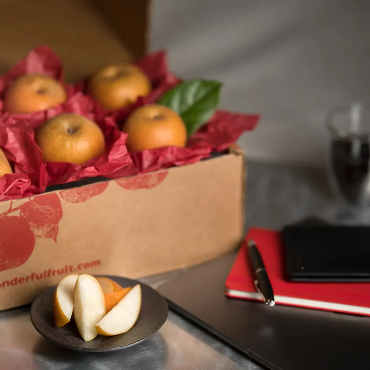 Corporate gift box with sliced pear for show