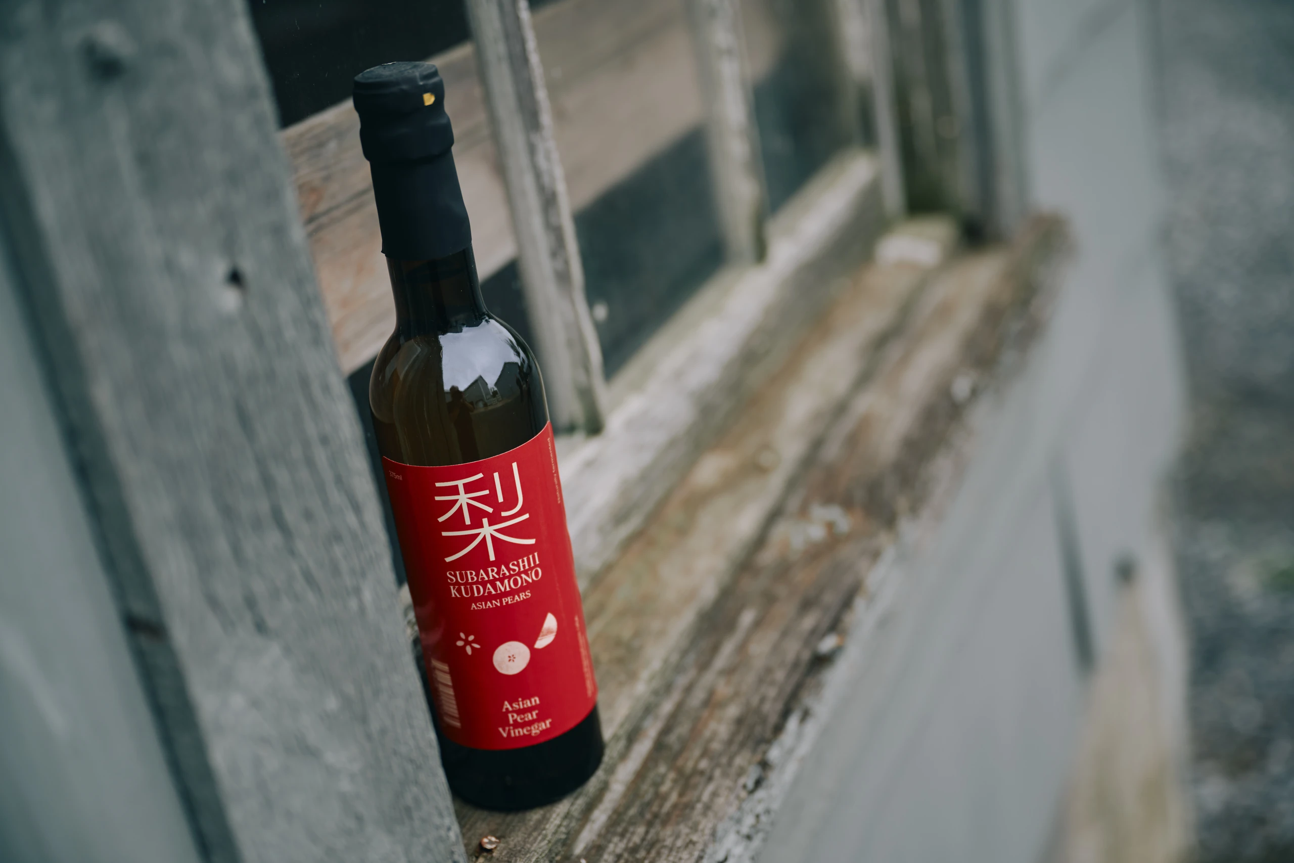 Asisan Pear Vinegar Bottle on Windowsill